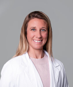 Deana Rhoads, FNP-BC, family nurse practitioner in white coat, Bullhead City AZ